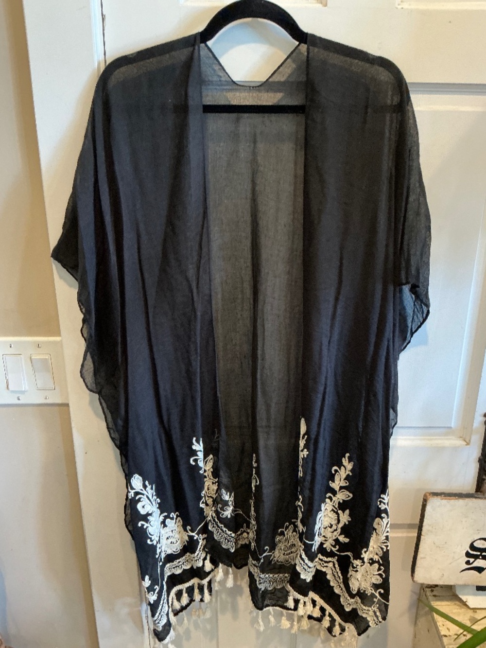 Lightweight kimono with embroidery details! And fringe!  One size fits most